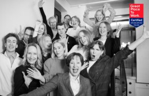 Alt text: Ahjo workers laughing